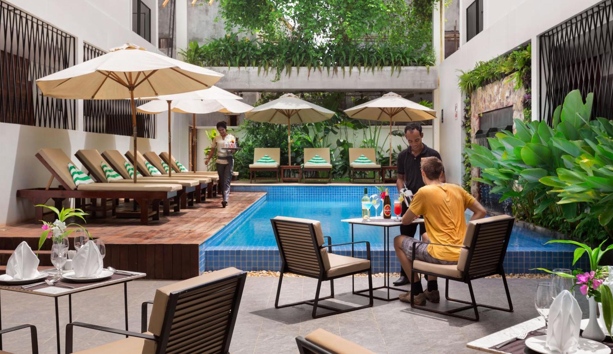 The Calm Oasis Hotel Siem Reap Bagian luar foto
